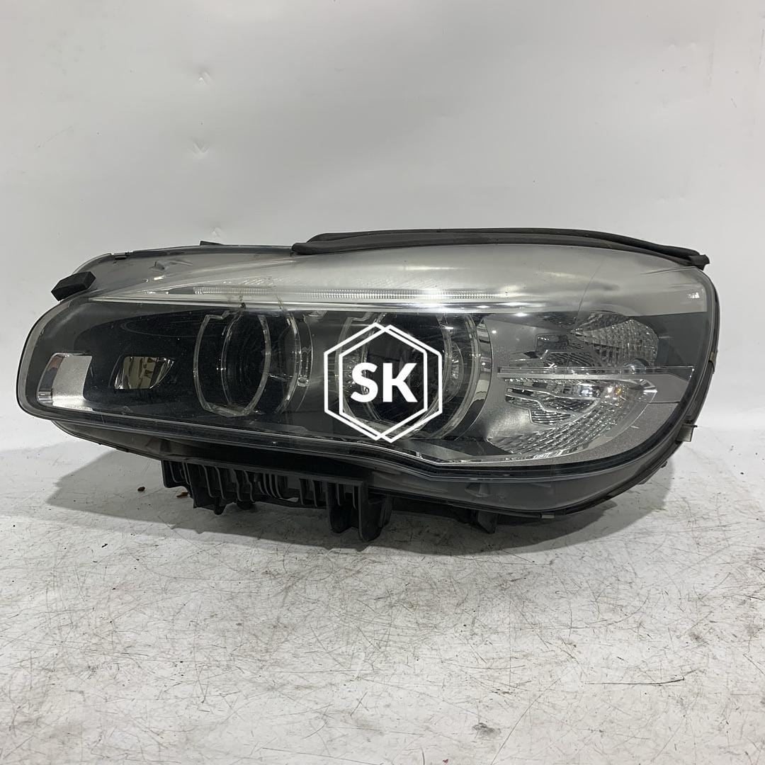216D GRAND HEADLIGHT (LEFT)